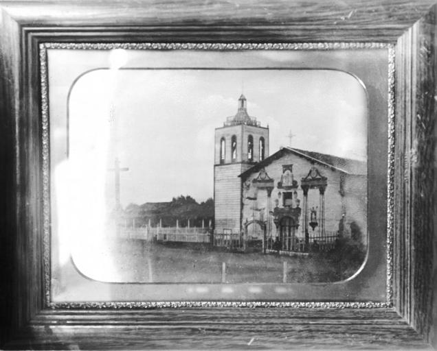 Framed tintype of Mission Santa Clara de Asis, 1875 (CHS-4327).jpg en <br> Framed tintype of Mission Santa Clara de Asis 1875 Photograph of a framed tintype by George Wharton James of Mission Santa Clara de Asis 1875 The square wood bell ...