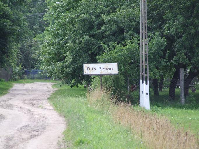 DubFerma-s1.jpg Wikiekspedycja2009 Own rhn Own work all rights released Public domain Dubińska Ferma City limit signs in Poland Historic road signs in Poland
