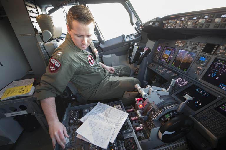 Kenneth Savage performing preflight checks of a P-8A Poseidon before a mission to locate Malaysian Airlines flight MH370.jpg en The U S Navy assists in the search for Malaysia Airlines flight MH370 PERTH Australia April 4 2014 Lt Kenneth ...