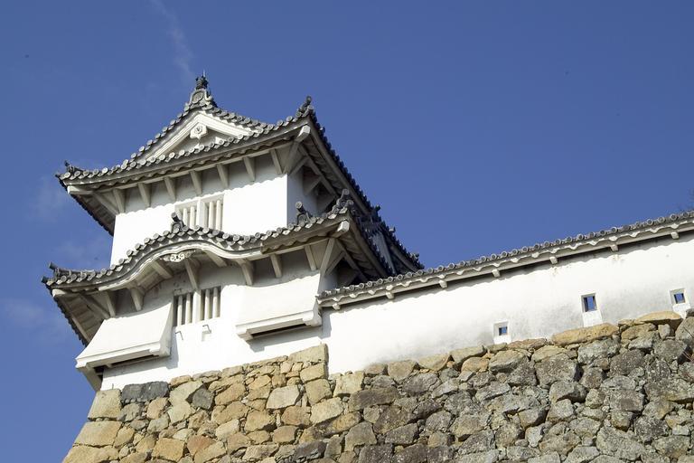 Himeji Castle M4718.jpg Wall and turret at Himeji Castle Himeji Hyogo Japan Windows for various defensive actions are visible I took this photo and contribute my rights in the file to the public domain Himeji Castle Keep Tower 2007-02-04 ...