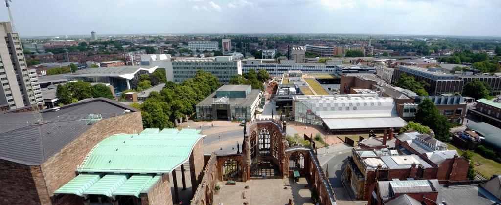 Coventry Cathedral Tower East Panorama.jpg en View east from the west tower of Coventry Cathedral across the ruined nave of the old cathedral toward Coventry University 2011-08-03 own Si mintchociecream released into the public domain via ...