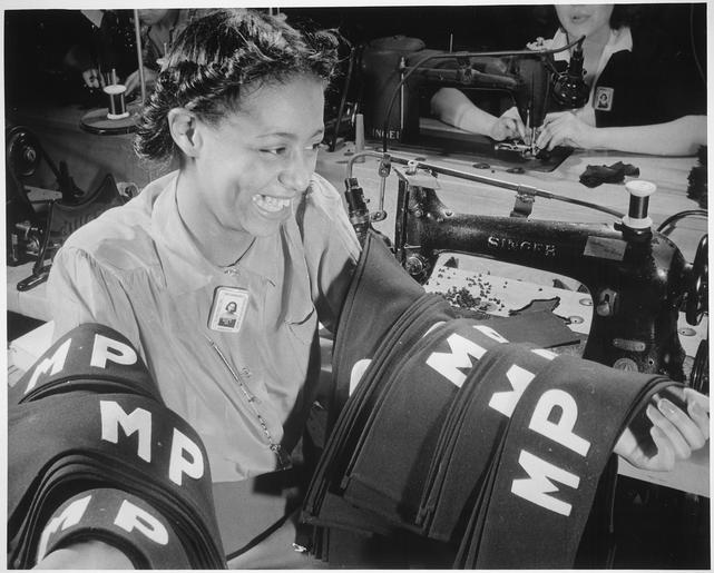 ...Insignia for military police are being turned out in an eastern quartermaster corps depot where this young worker has o - NARA - 535807.tif Local identifier 208-NP-2HHH-1 Office for Emergency Management Office of War Information Domestic ...
