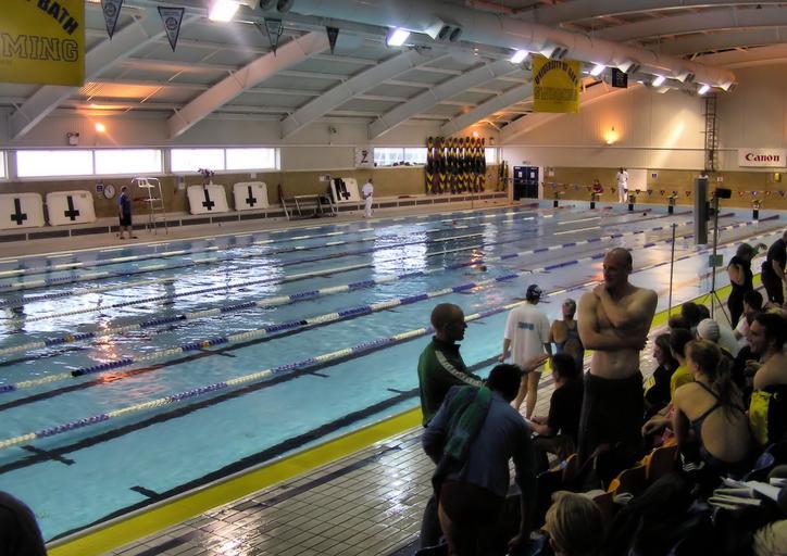 Universityofbath 50metre pool arp.jpg The University of Bath Sports Training Village 50 metre swimming pool Bath England The depth is constant at 2 metres The yellow and black canoes are for water sport The black crosses on the white boards ...