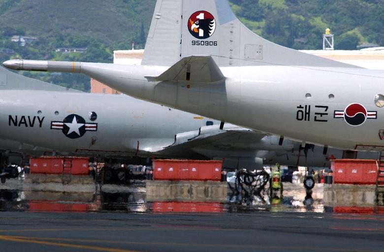 USN and ROK P-3 Orions.jpg 040703-N-6932B-036 Marine Corps Air Station Kaneohe Hawaii July 3 2004 - Patrol aircraft representing the Republic of Korea and the United States line the tarmac at Marine Corps Air Station Kaneohe Hawaii The ...