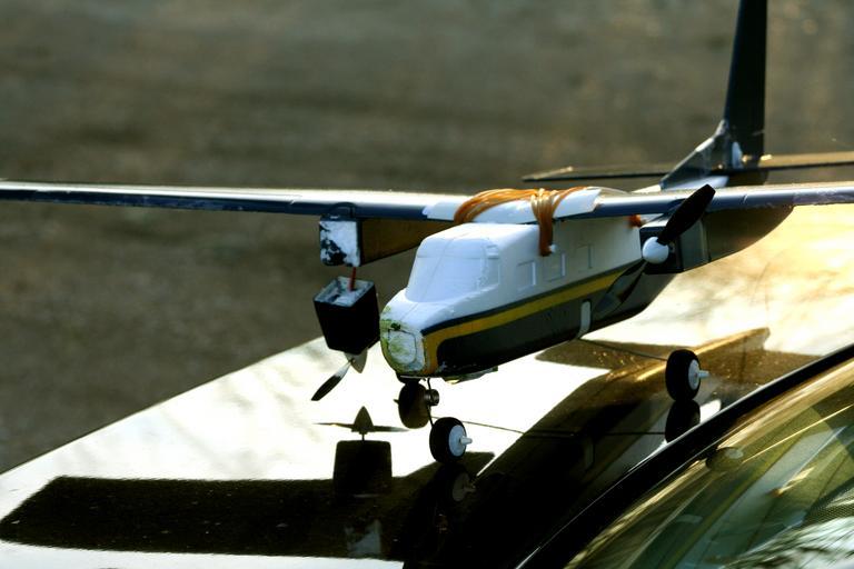 You can see the damaged propeller clearly on the left. It isn't supposed to hang down like that. plane airplane fly model crash patrick