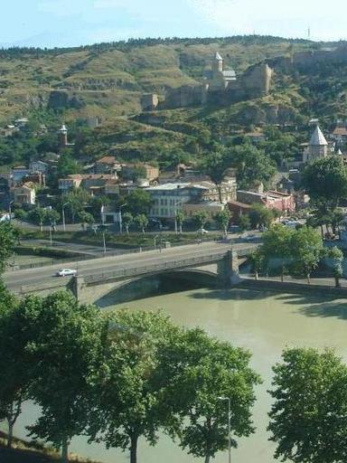 Metekhi bridge over River Kura, Tbilisi.JPG Metekhi bridge over the Kura River in Tbilisi Georgia The Narikala fortress is seen in the background Own 2006 Kober Narikala Kura Tbilisi Metekhi Bridge